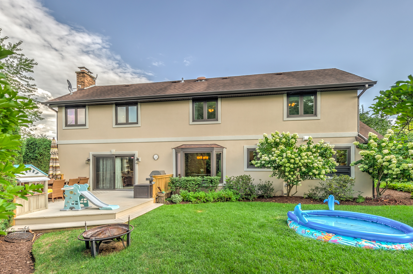 11400 Burr Oak Lane Burr Ridge, IL 60527 - Photo 37 of 40 a house view with a garden space