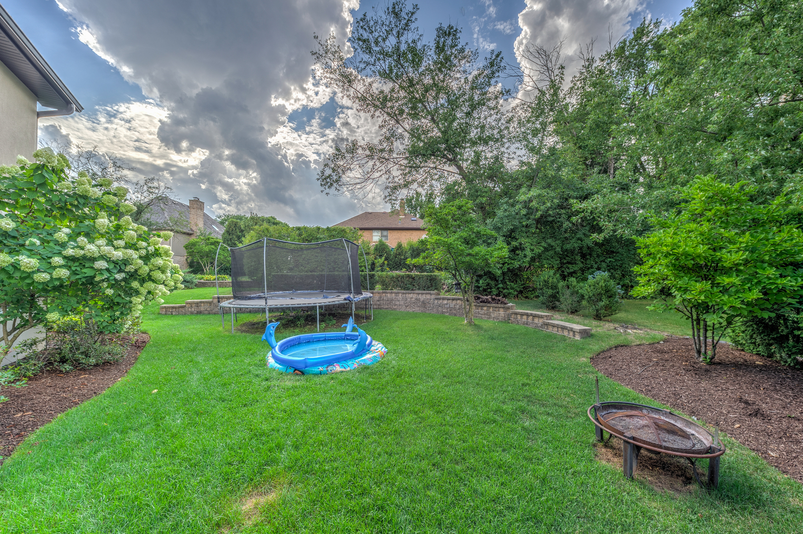 11400 Burr Oak Lane Burr Ridge, IL 60527 - Photo 38 of 40 a view of a backyard with furniture