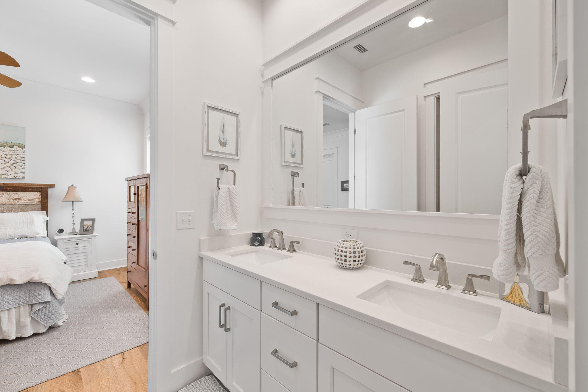 158 Trailhead Drive Inlet Beach, FL 32461 - Photo 29 of 35 a bathroom with double vanity sink and a mirror