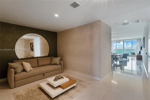 a view of swimming pool with a patio