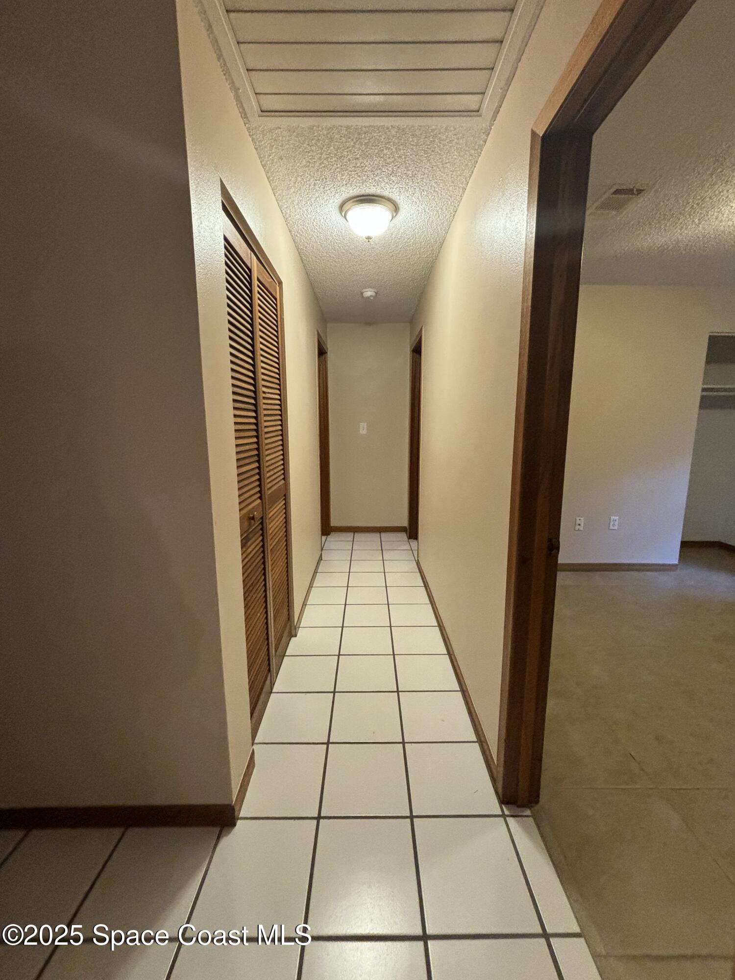 1201 Northeast Tropicana Road Palm Bay, FL 32905 - Photo 19 of 23 a view of entryway