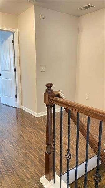 4408 Black Hills Drive Northwest Kennesaw, GA 30144 - Photo 14 of 33 a view of a hallway with wooden floor