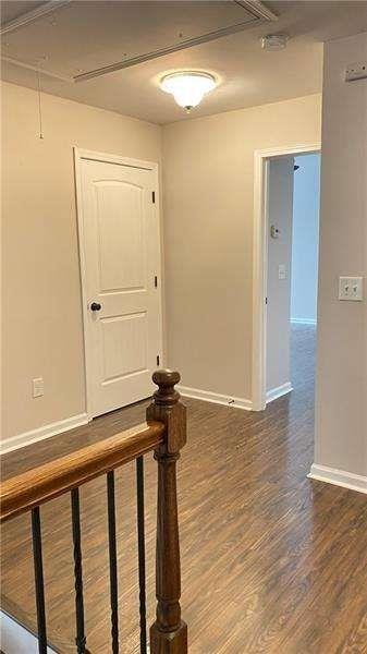 4408 Black Hills Drive Northwest Kennesaw, GA 30144 - Photo 17 of 33 a view of a hallway with wooden floor