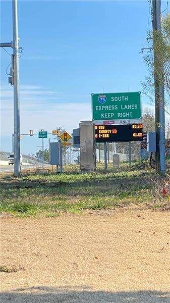 4408 Black Hills Drive Northwest Kennesaw, GA 30144 - Photo 29 of 33 a view of a garden with a bench