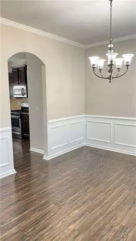 a view of a livingroom with wooden floor