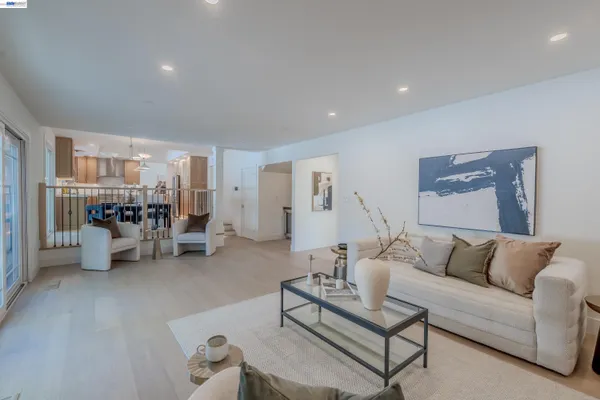 a living room with furniture and a table