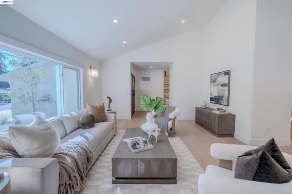 a living room with furniture and a couch
