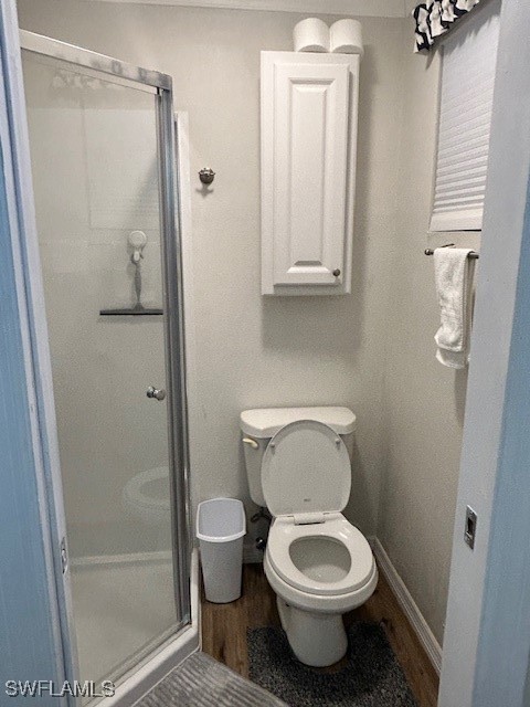 19681 Summerlin Road, Unit 404 Fort Myers, FL 33908 - Photo 27 of 34 a bathroom with a toilet and a shower