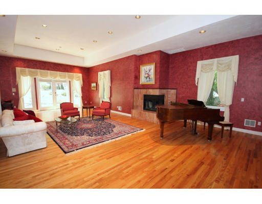 361 Dudley Road Newton, MA 02459 - Photo 3 of 13 a living room with furniture and a wooden floor