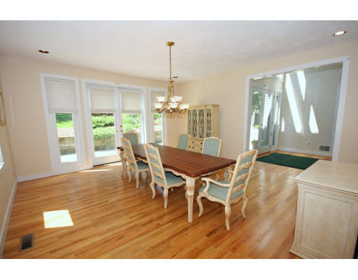 361 Dudley Road Newton, MA 02459 - Photo 4 of 13 a view of a dining room with furniture and wooden floor