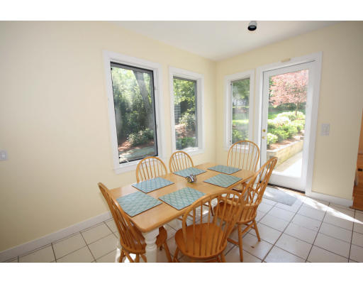 361 Dudley Road Newton, MA 02459 - Photo 6 of 13 a view of a dining room with furniture window and outside view