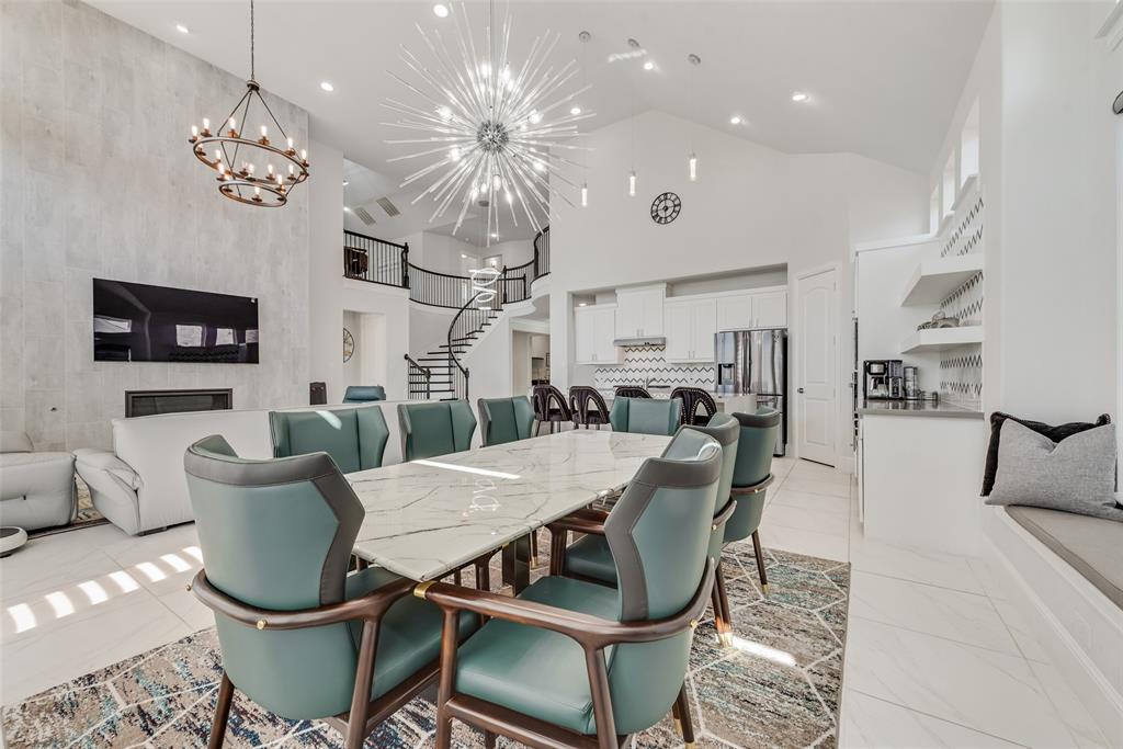 2341 Haft River Road Frisco, TX 75034 - Photo 13 of 36 Dining area featuring a high ceiling, recessed lighting, and a chandelier