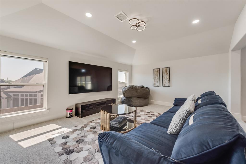2341 Haft River Road Frisco, TX 75034 - Photo 20 of 36 Living room featuring carpet flooring, recessed lighting, and vaulted ceiling