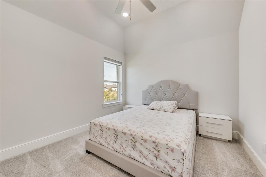 2341 Haft River Road Frisco, TX 75034 - Photo 29 of 36 Bedroom with light colored carpet and ceiling fan