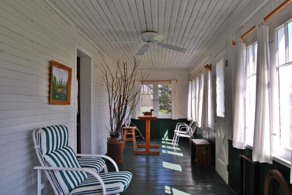 8348 9 Mile Road Mecosta, MI 49332 - Photo 11 of 13 11 Front 3 season Porch
