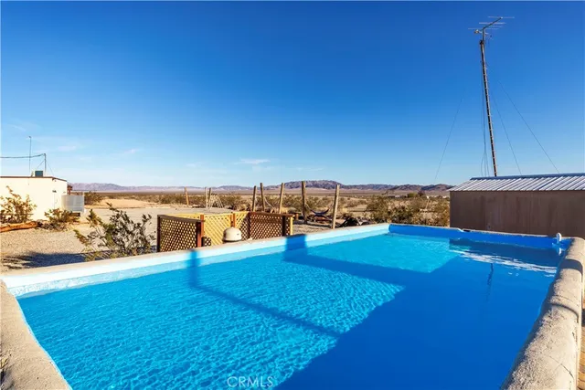 a outdoor space with lots of tables and chairs