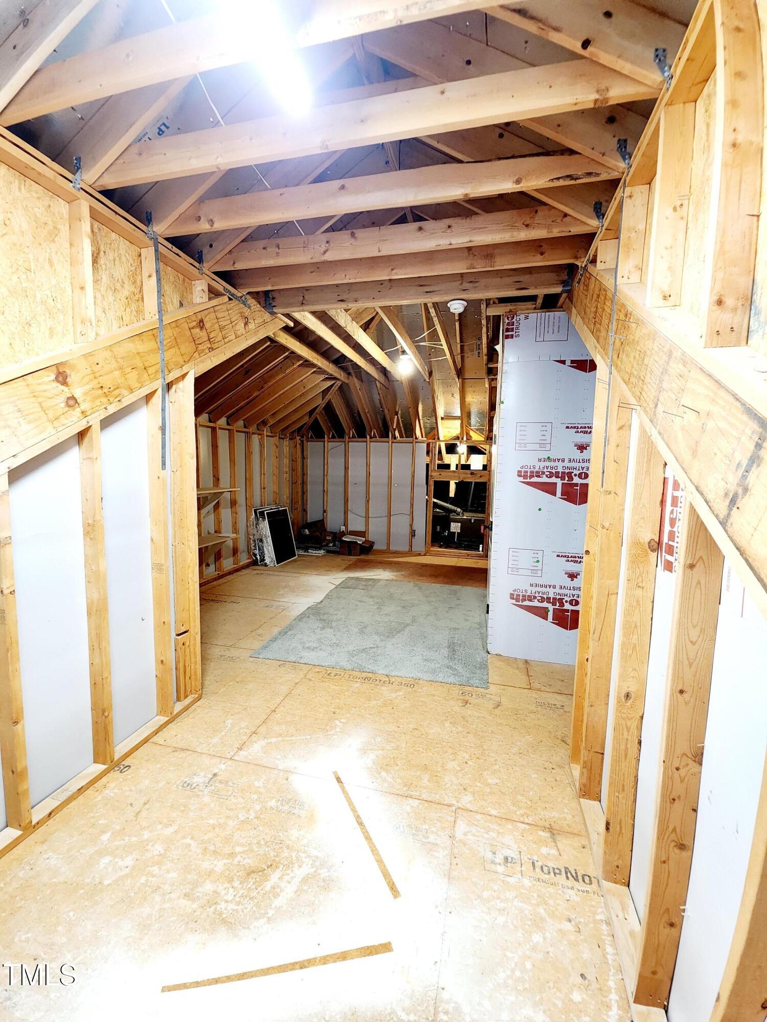 1317 Pecora Lane Raleigh, NC 27607 - Photo 42 of 48 Third floor walk-up attic for storage or future expansion.