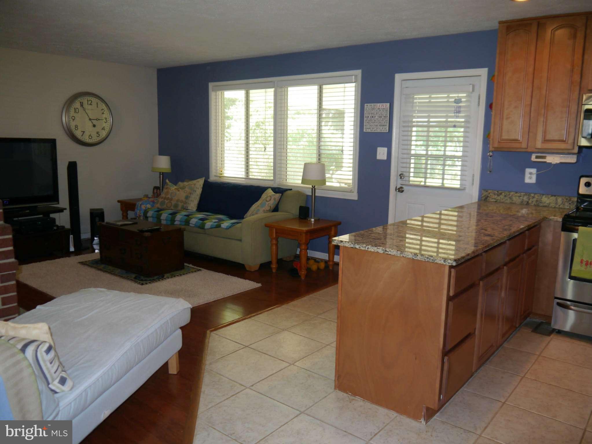 7412 Inzer Street Springfield, VA 22151 - Photo 12 of 27 a living room with furniture and window