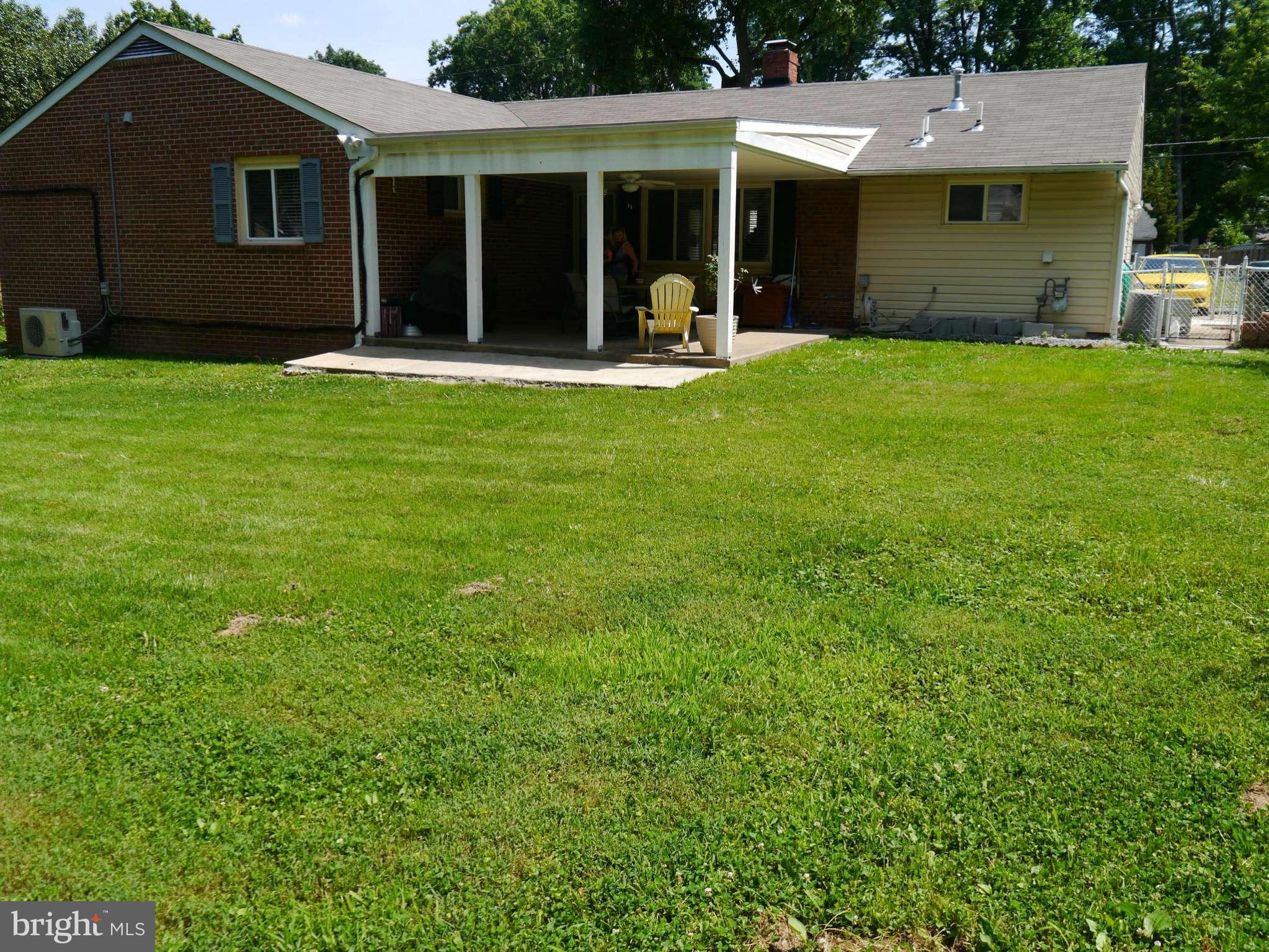 7412 Inzer Street Springfield, VA 22151 - Photo 22 of 27 a view of a house with a yard and front view of a house