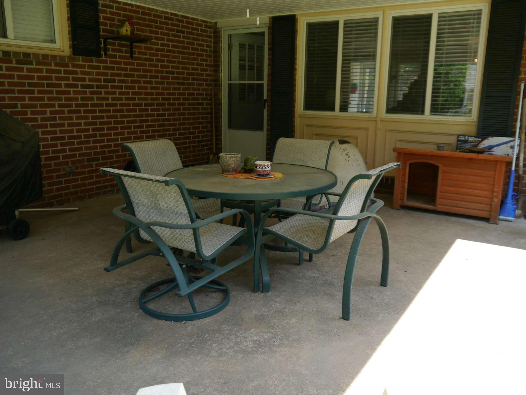7412 Inzer Street Springfield, VA 22151 - Photo 25 of 27 a view of a outdoor seating area with furniture