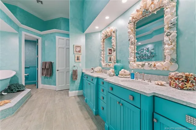 a bedroom with a bed and dresser