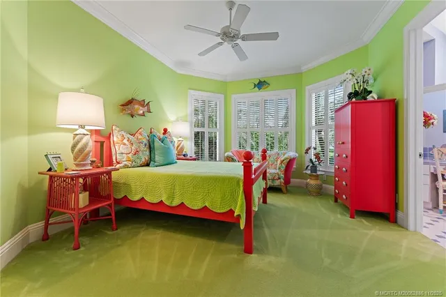 a bathroom with a sink mirror and toilet
