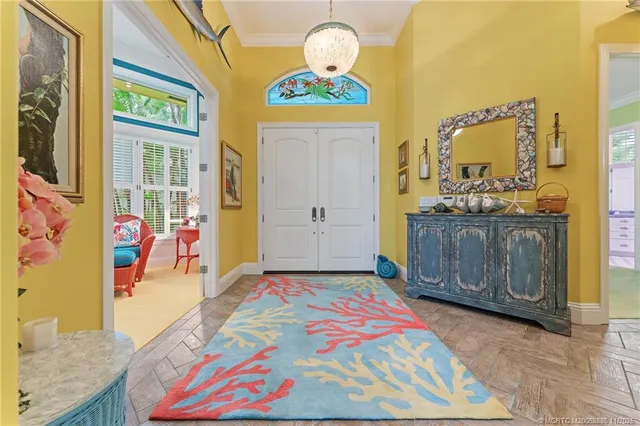 a bedroom with a bed dresser and a window