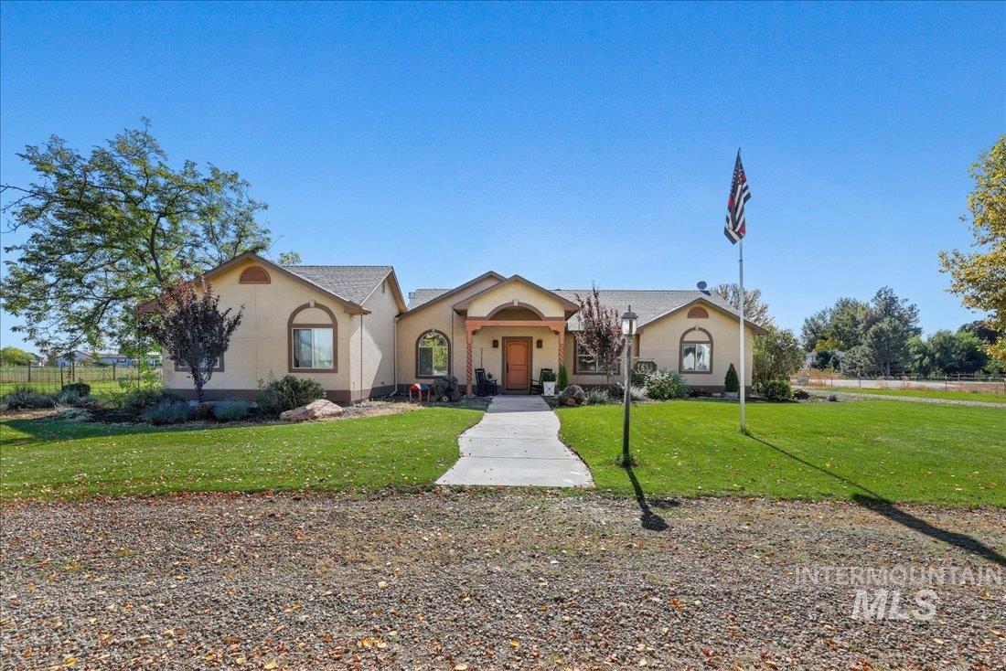 7639 Elko Lane Middleton, ID 83644 - Photo 1 of 47 View of front of home with stucco siding