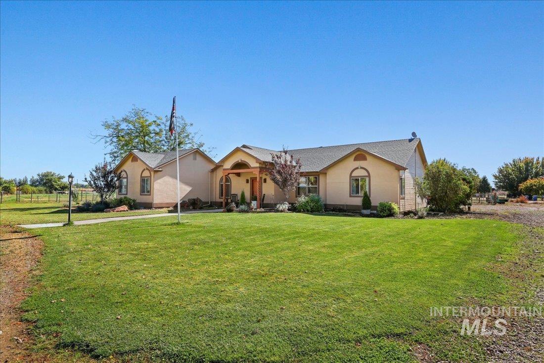 7639 Elko Lane Middleton, ID 83644 - Photo 2 of 47 View of front of home with a front lawn