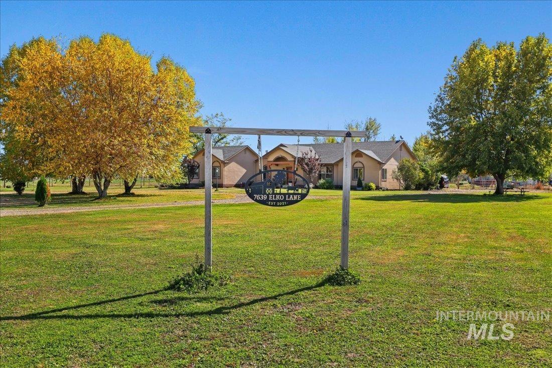 7639 Elko Lane Middleton, ID 83644 - Photo 3 of 47 View of property's community with a lawn