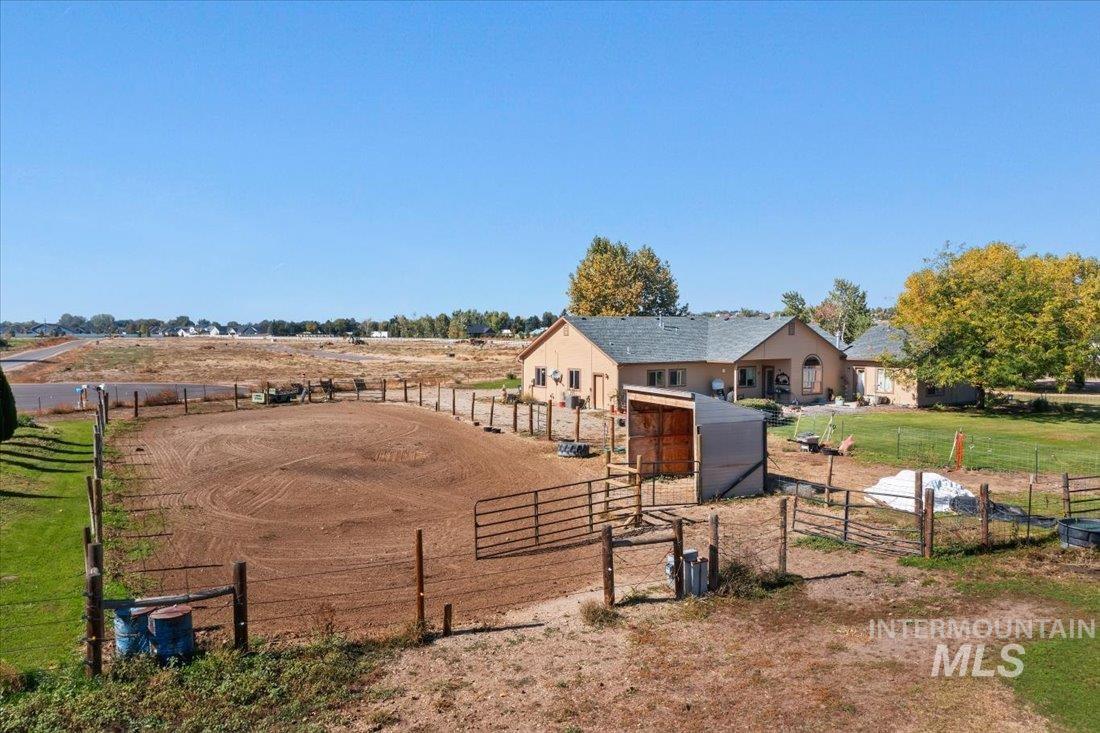 7639 Elko Lane Middleton, ID 83644 - Photo 36 of 47 View of yard featuring a rural view and an enclosed riding area