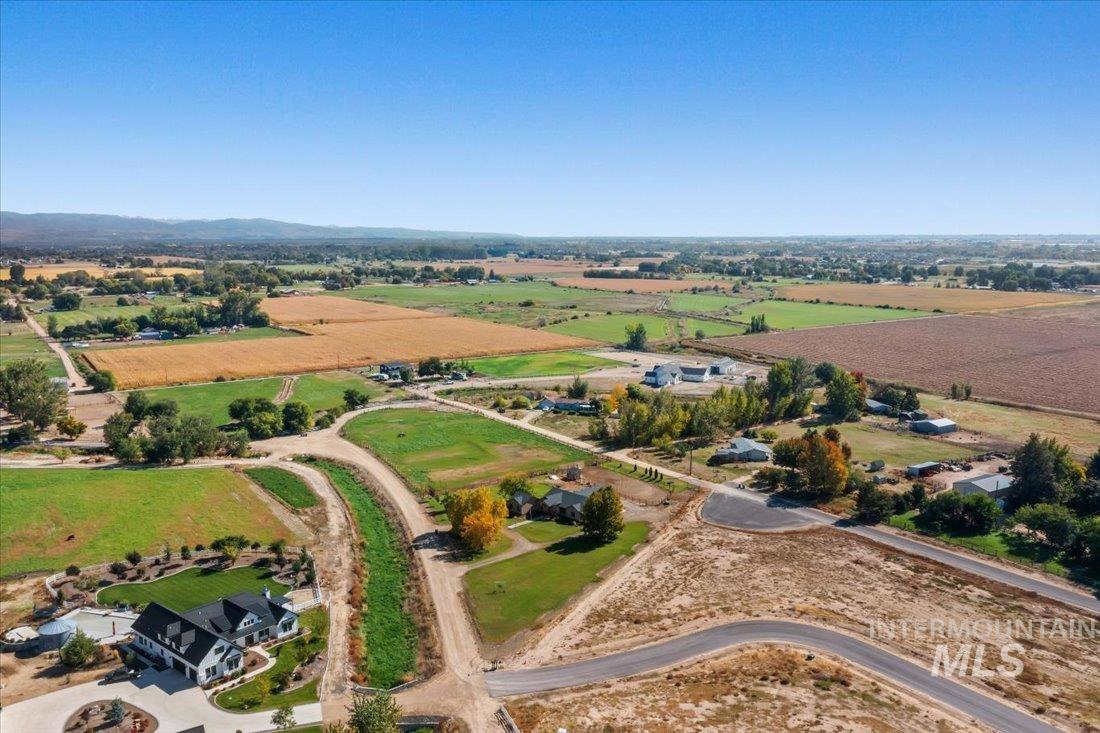 7639 Elko Lane Middleton, ID 83644 - Photo 40 of 47 Aerial view of property and surrounding area featuring rural landscape and extensive farmland