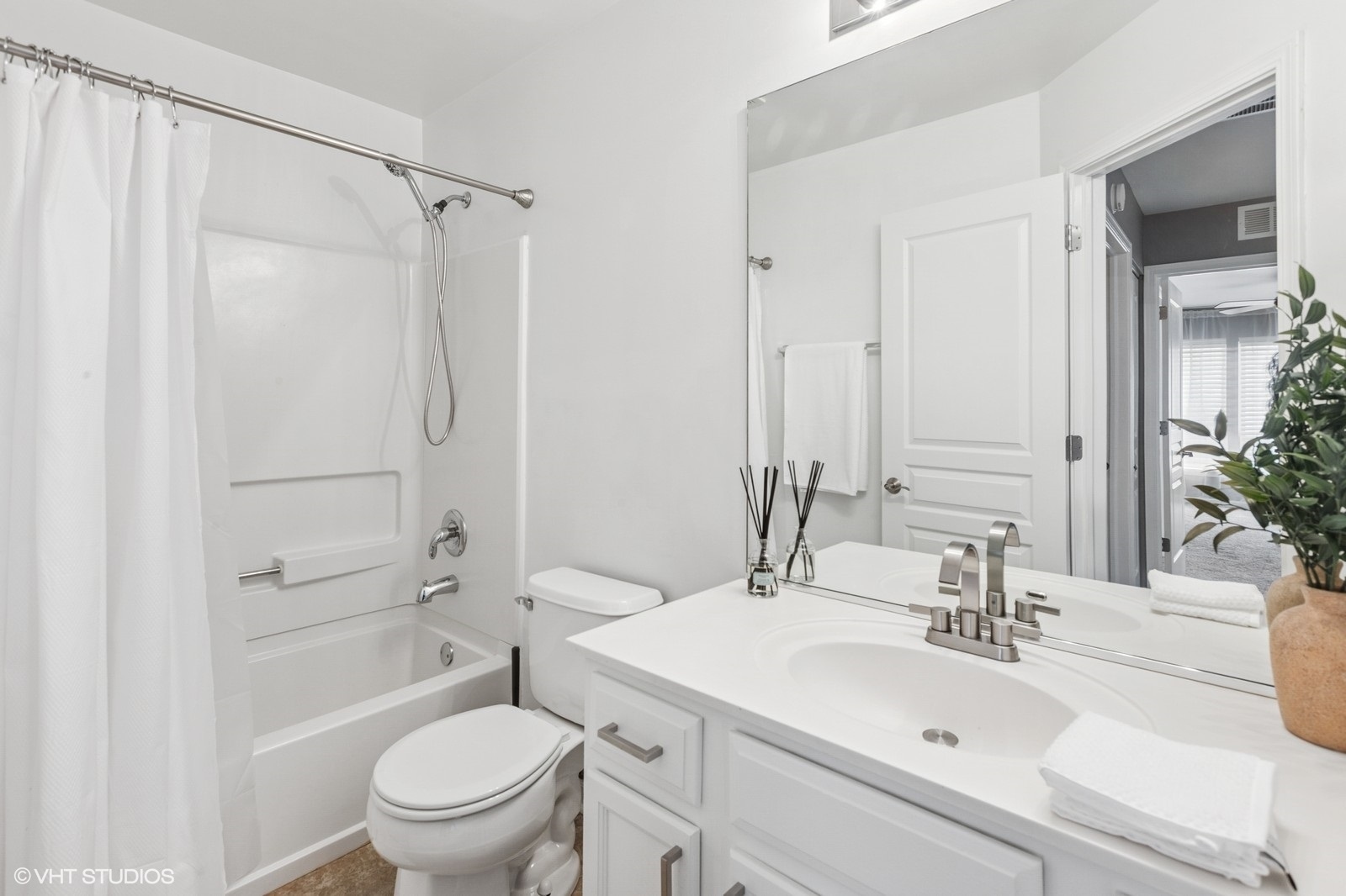 24843 Franklin Lane Plainfield, IL 60585 - Photo 14 of 18 a bathroom with a sink toilet and shower