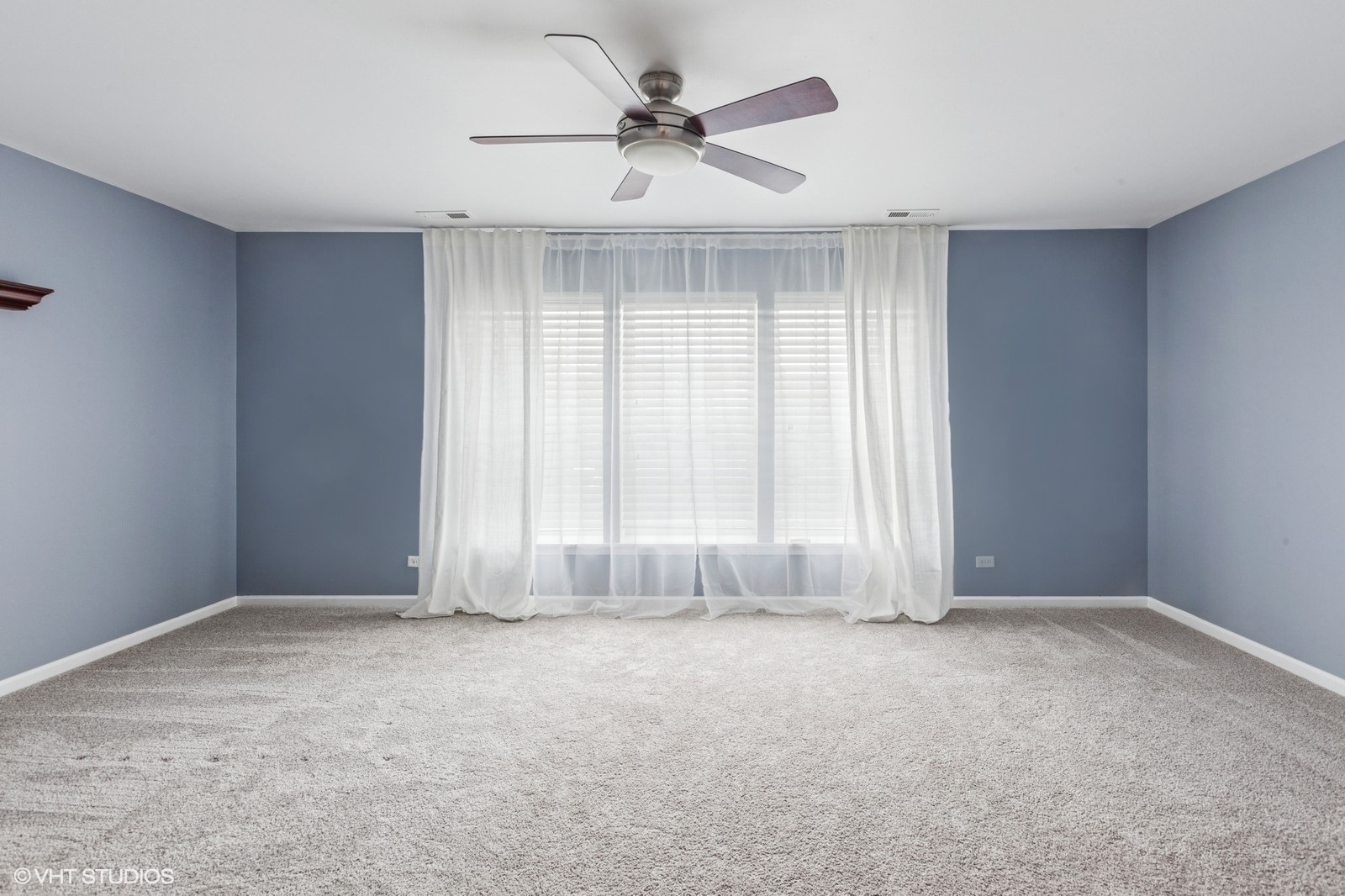 24843 Franklin Lane Plainfield, IL 60585 - Photo 9 of 18 a view of an empty room with a window