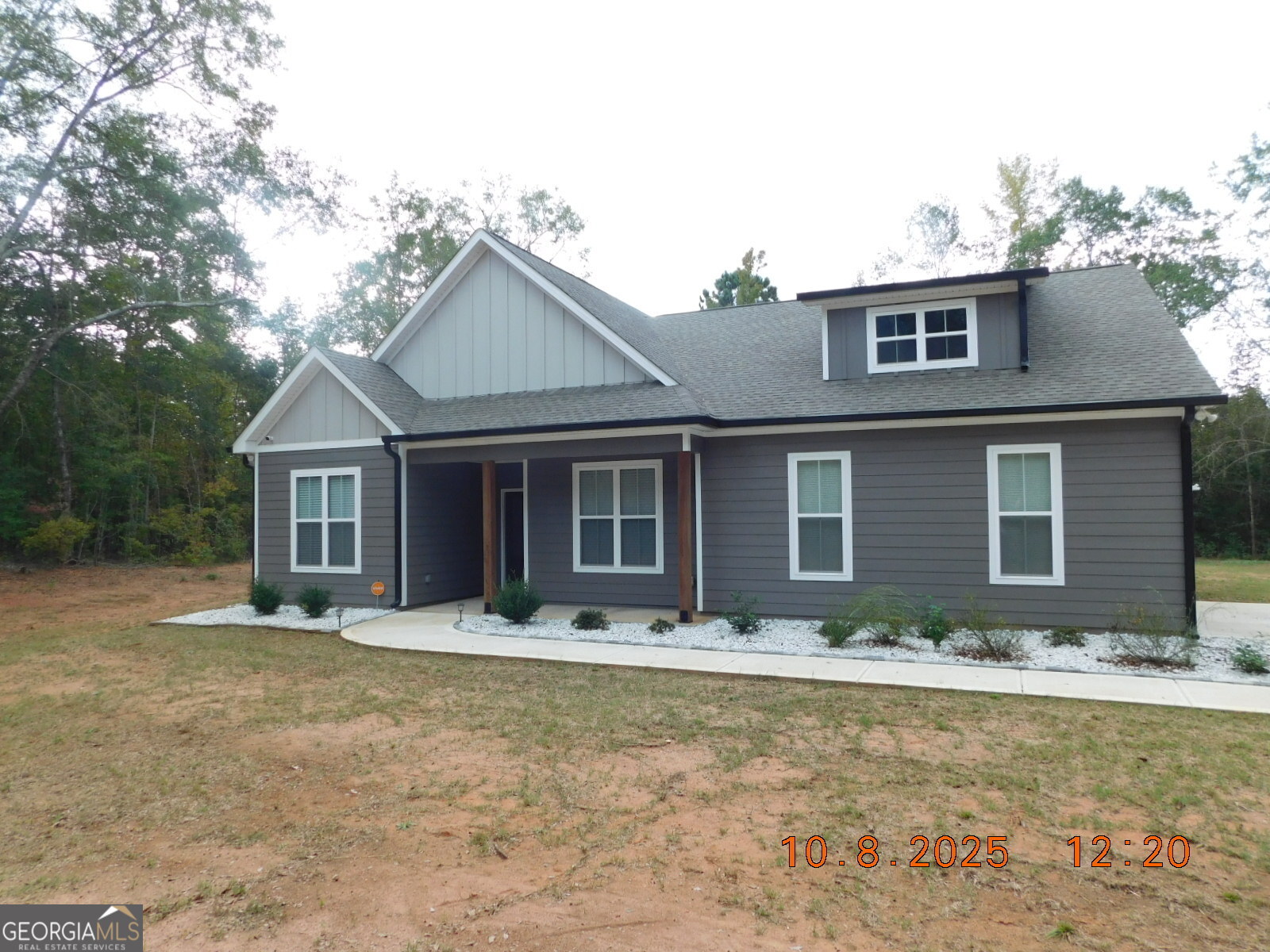 725 McCollum Road Barnesville, GA 30204 - Photo 1 of 1 a front view of a house with a yard
