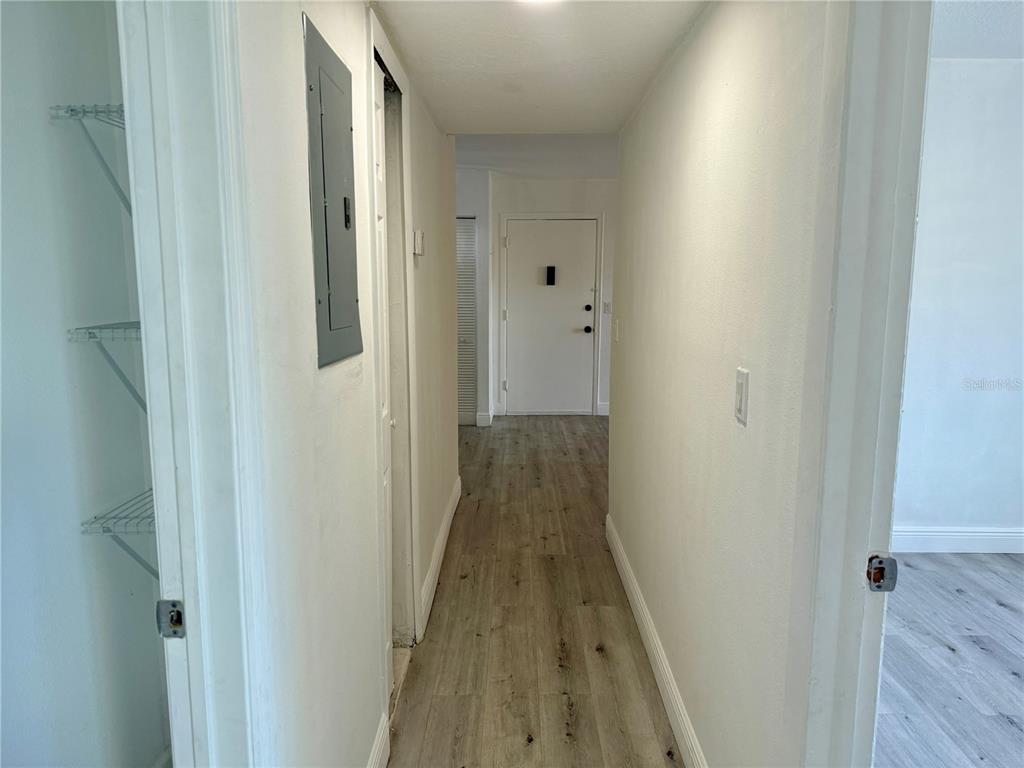 900 North Lake Destiny Road, Unit A Altamonte Springs, FL 32714 - Photo 11 of 26 a view of a hallway with wooden floor and staircase