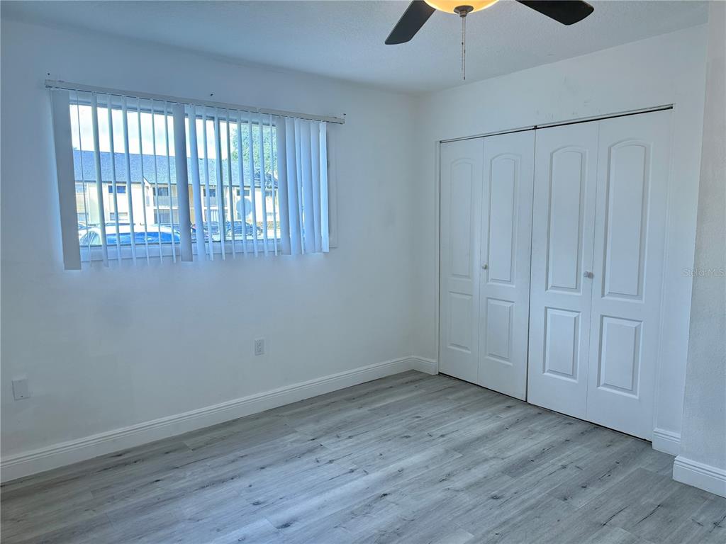 900 North Lake Destiny Road, Unit A Altamonte Springs, FL 32714 - Photo 13 of 26 wooden floor in an empty room with a window