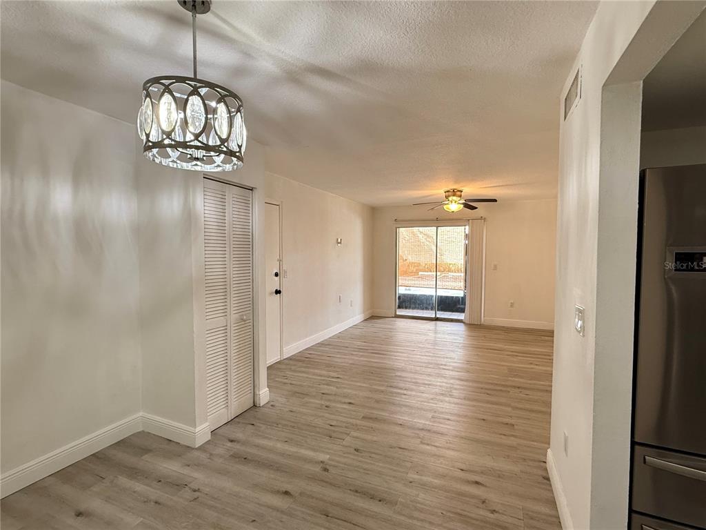 900 North Lake Destiny Road, Unit A Altamonte Springs, FL 32714 - Photo 7 of 26 a view of an empty room with window and wooden floor