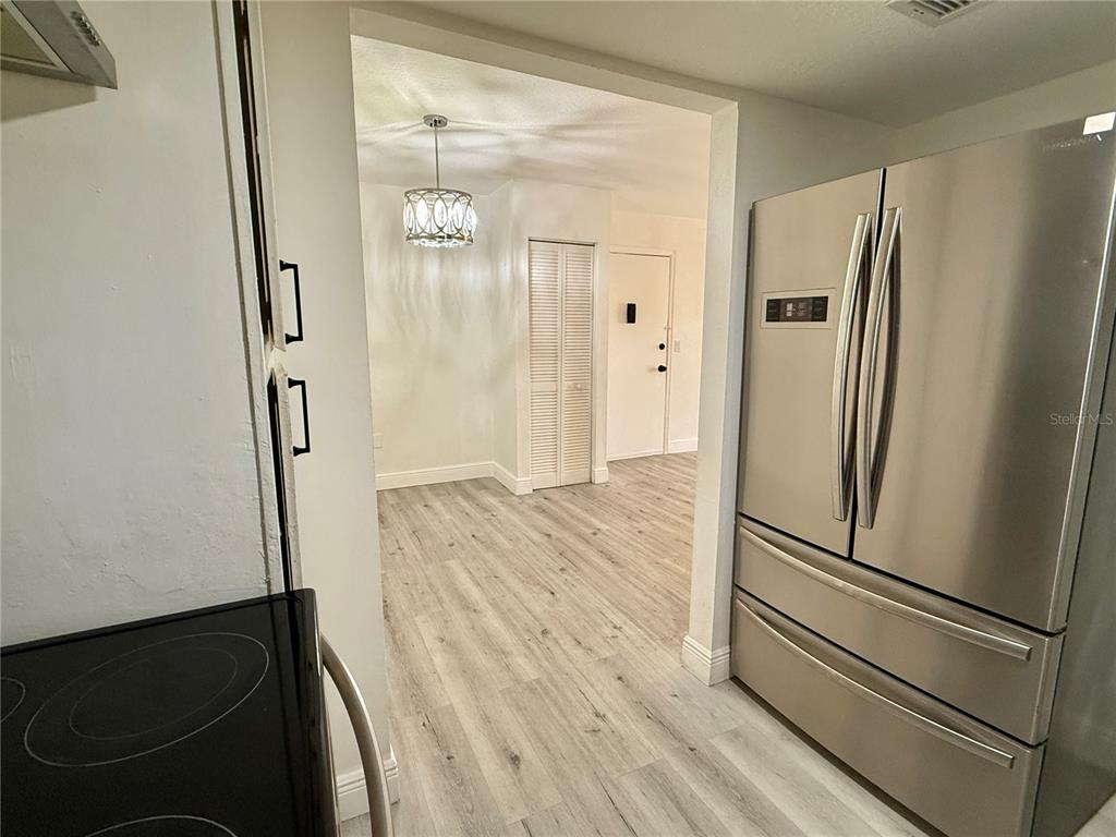 900 North Lake Destiny Road, Unit A Altamonte Springs, FL 32714 - Photo 9 of 26 a view of walk in closet with wooden floor