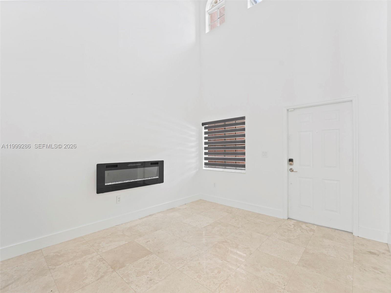 13404 Southwest 153 Terrace, Unit 2005 Miami, FL 33177 - Photo 14 of 49 a view of a room with a window