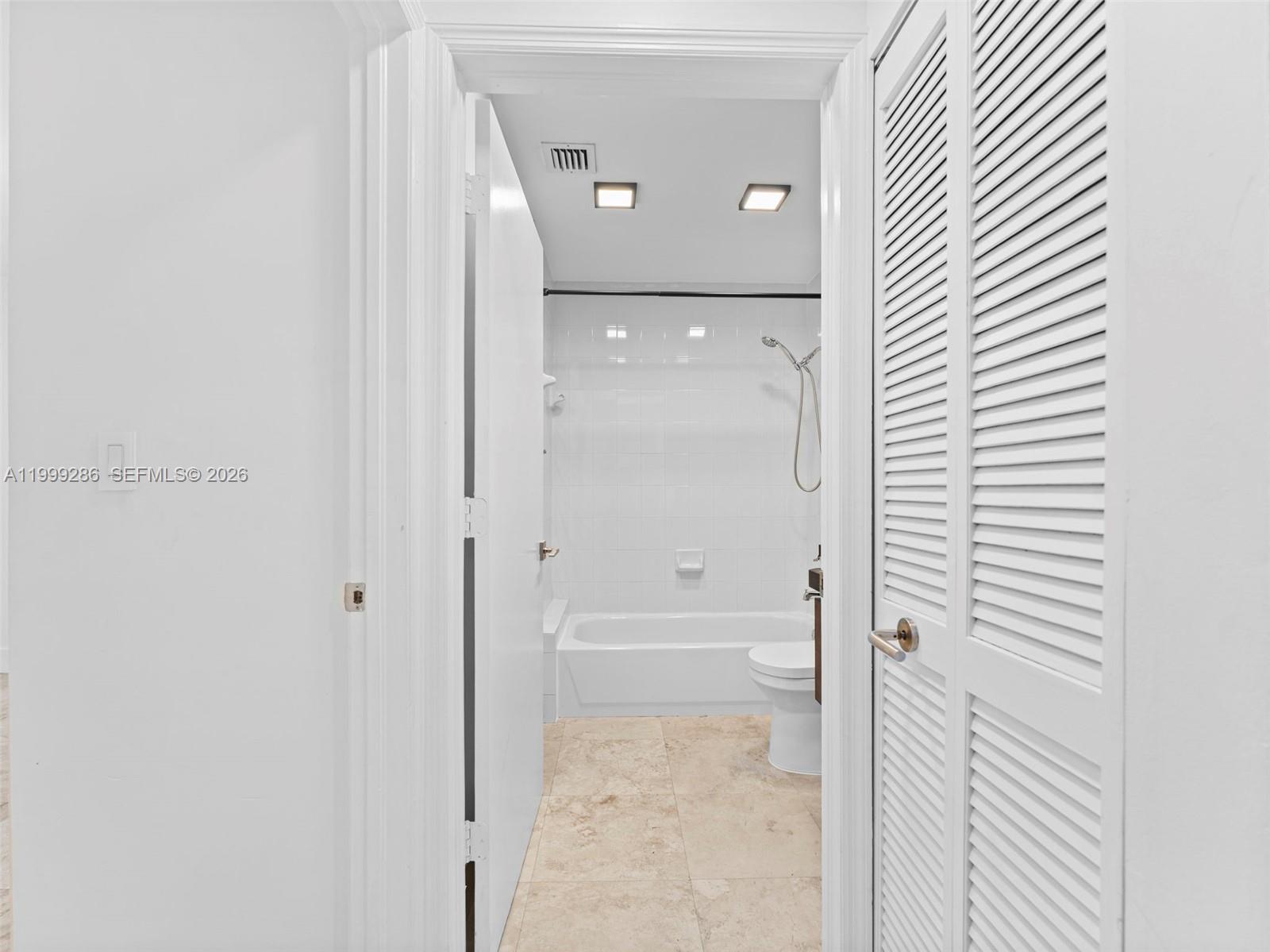 13404 Southwest 153 Terrace, Unit 2005 Miami, FL 33177 - Photo 10 of 49 a view of a bathroom with a glass door