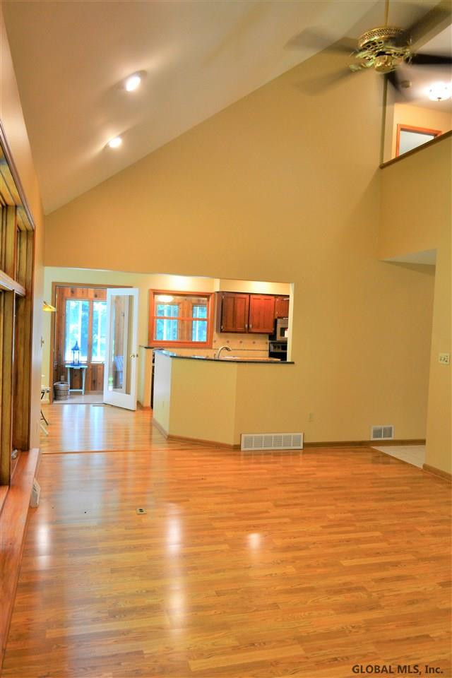 15 Stonegate Road Ballston, NY 12019 - Photo 11 of 25 Vaulted ceiling with 2nd floor overlook.