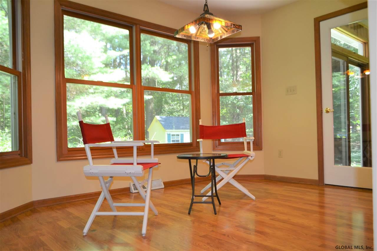 15 Stonegate Road Ballston, NY 12019 - Photo 6 of 25 Overlooks back yard and entry to sunroom