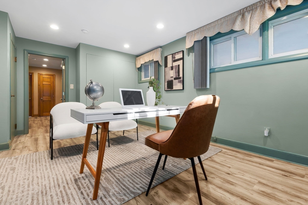 97 Oak Street Stoneham, MA 02180 - Photo 26 of 42 a view of a workspace with furniture