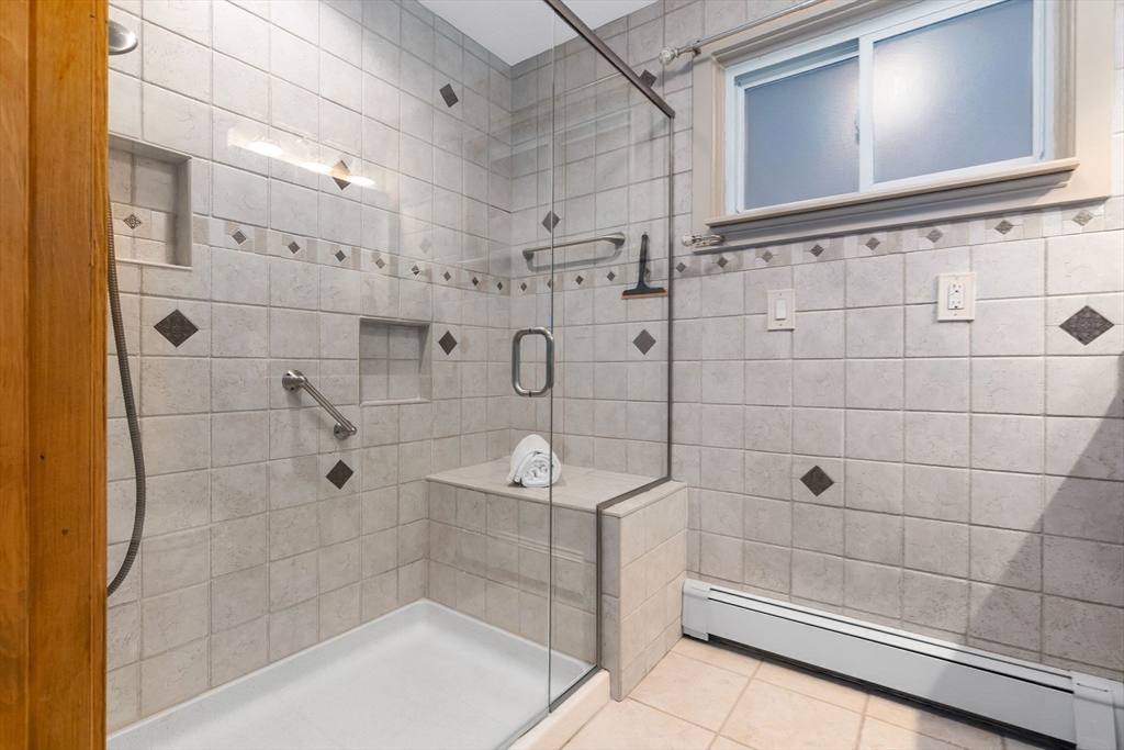 97 Oak Street Stoneham, MA 02180 - Photo 28 of 42 a bathroom with a shower