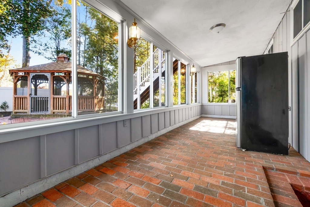 97 Oak Street Stoneham, MA 02180 - Photo 36 of 42 a view of a large window with an outdoor space