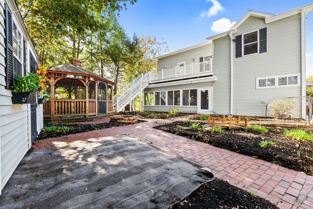 97 Oak Street Stoneham, MA 02180 - Photo 42 of 42 a view of a house with a yard
