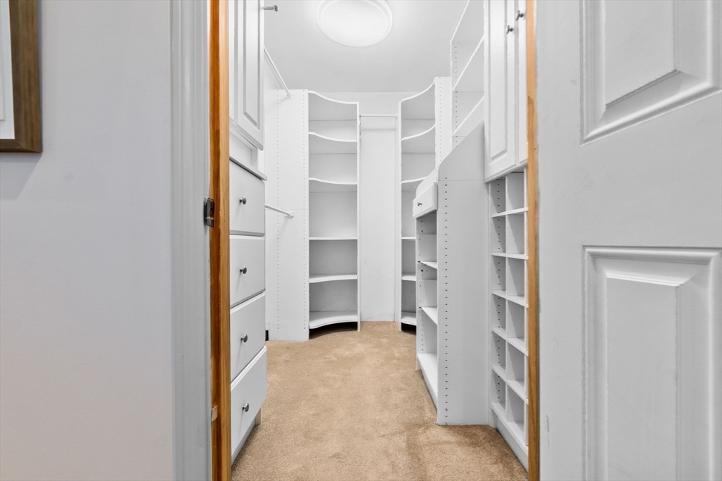 97 Oak Street Stoneham, MA 02180 - Photo 9 of 42 a view of closet with rug and white walls