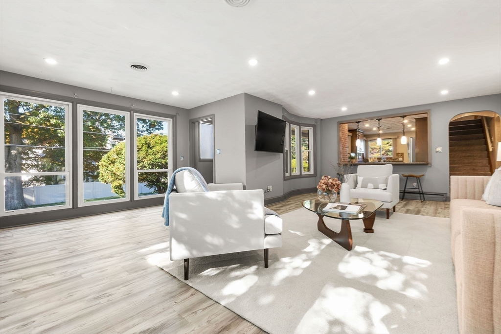 97 Oak Street Stoneham, MA 02180 - Photo 10 of 42 a living room with furniture and a large window