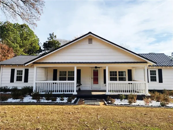 front view of a house with a yard